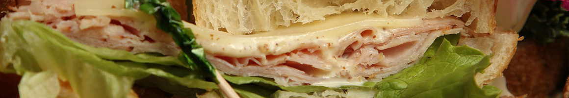 Eating Deli Sandwich at Kurt Schulz Deli & Pastry Shoppe restaurant in Milwaukee, WI.